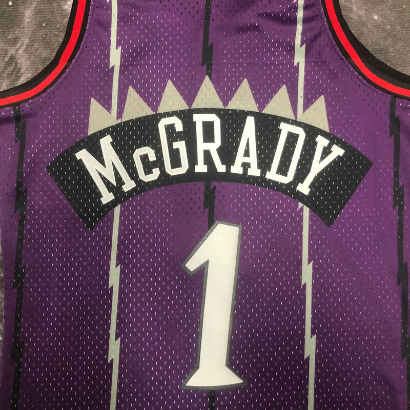 Regata Toronto Raptors Retrô Mitchell & Ness 1998/1999 McGrady Roxa